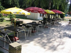 Outdoor terrace with tables and parasols