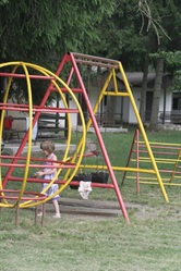 Playground with swings and a climbing frame