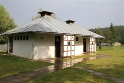 Sanitary building with a grey roof